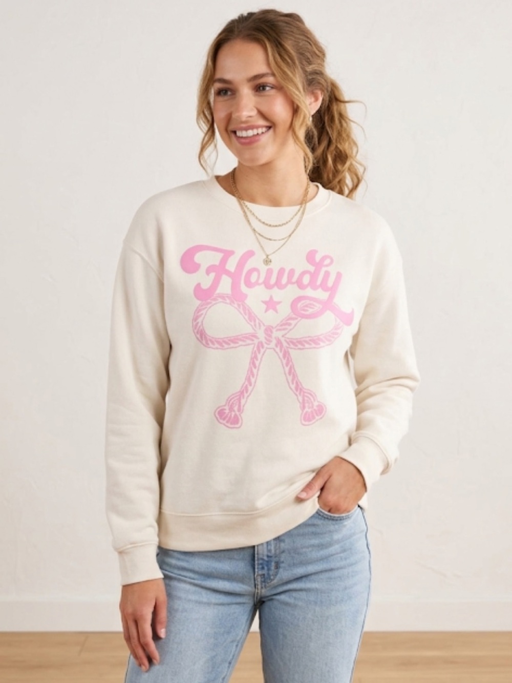 Wound Up Women's Cream Sweater with “Howdy”